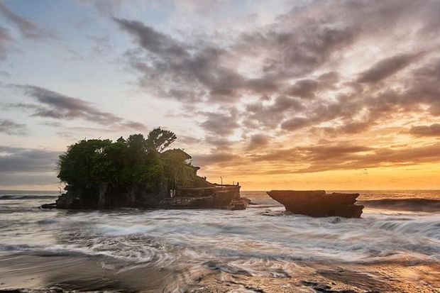 The iconic temple of Tanah Lot at sunset