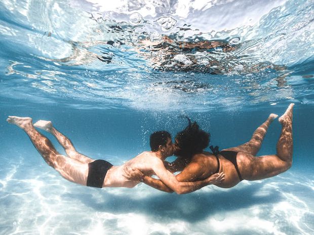 Swimming in azure waters in Mauritius.