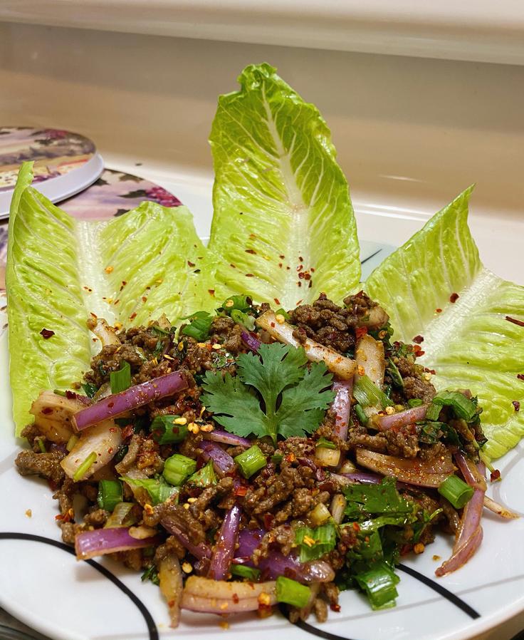 Frontal shot of a Larb Leuat Neua dish