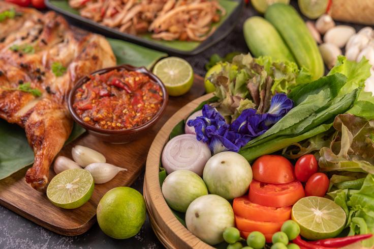 Shot of a grilled chicken with Sambal and veggies, typical of Balinese cuisine