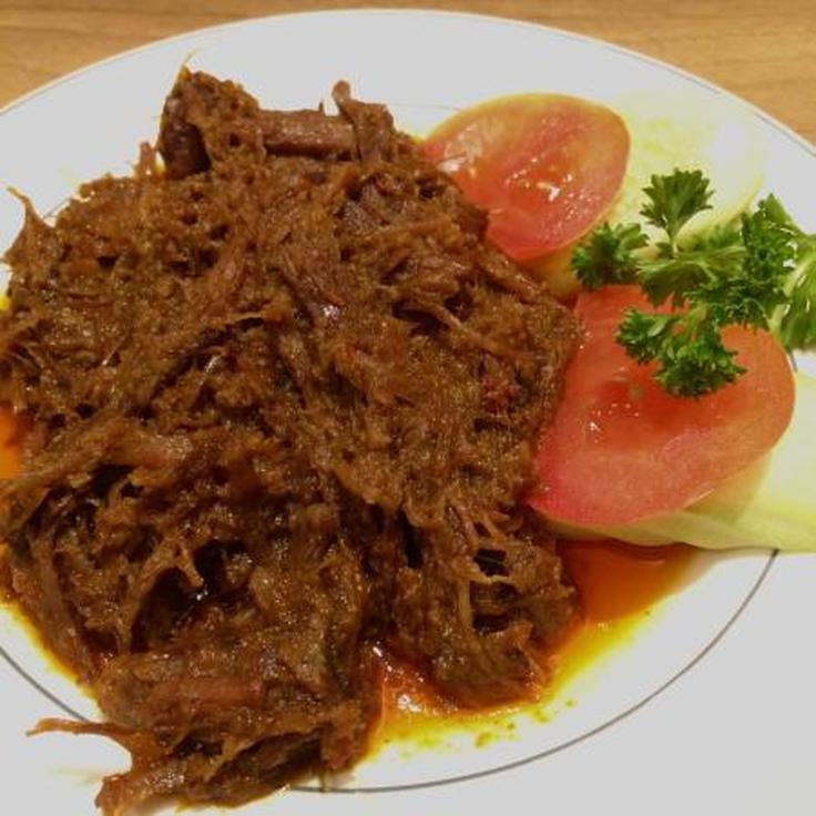 Shot of a beef dish at Madam Kwan Restaurant