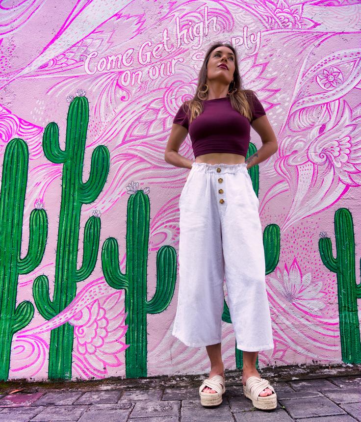 Girl posing in Coffee Cartel, a popular coffee destination in Bali