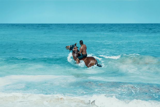 Horse riding in these azure waters is simply dreamy.