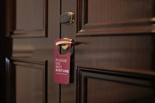 “Do Not Disturb” sign helps with safety and privacy.