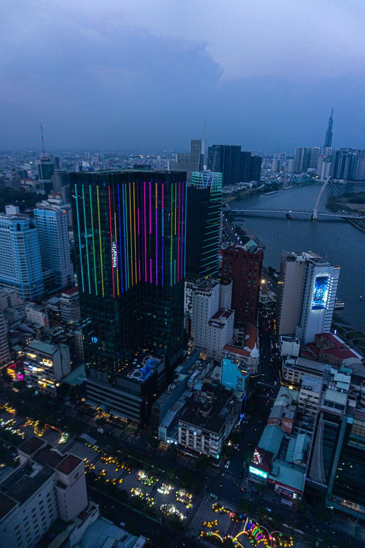 Views of ails and enjoying the pulsating beats of music. Some popular rooftop bars include Chill Skybar, EON Heli Bar from the Bitexco Financial Tower at night with the lights on