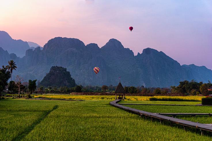 Shot at sunset of Vieng Tara  rice field in Vang Vieng, Laos