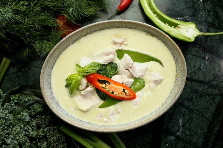 Shot of a green curry dish