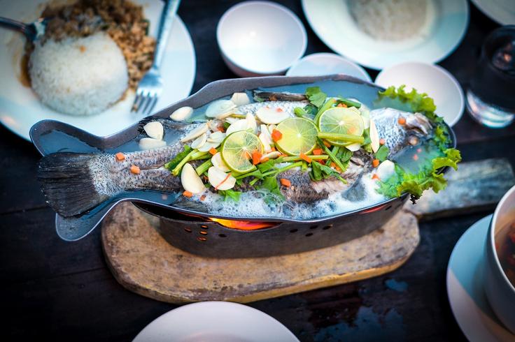 Frontal shot of a Grilled Fish dish cooked with Thai spices