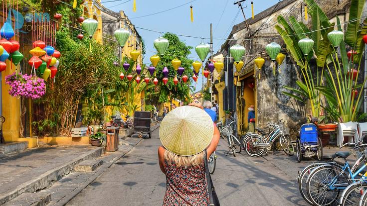 Shot of a girl in the little streets of Hoi An, Vietnam