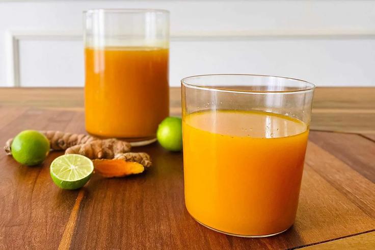 Shot of a Jamu Herbal Tonic glass typical from Bali