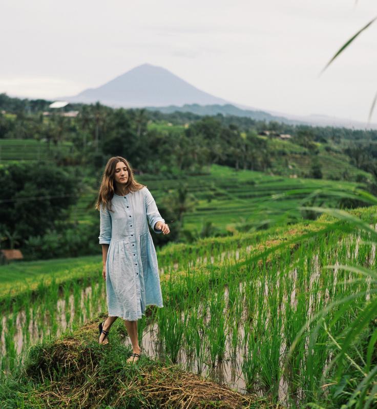 Shot of a girl strolling around Jatiluwih Rice Terraces