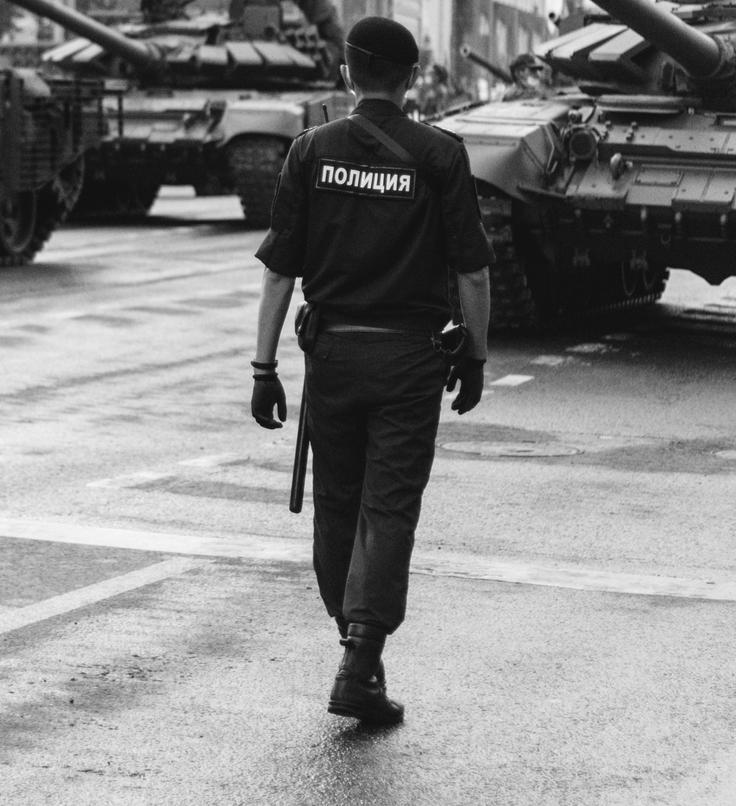 Shot of a policeman in Kuala Lumpur, re-enforcing safety in the city