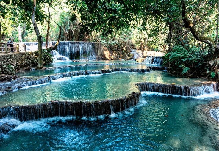 Shot of the natural blue water waterfalls of Luang Prabang called Kuang Si Falls