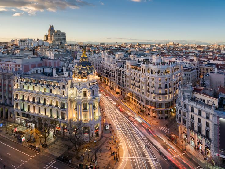 Shot of Madrid metropolis from the top of a rooftop mar at night