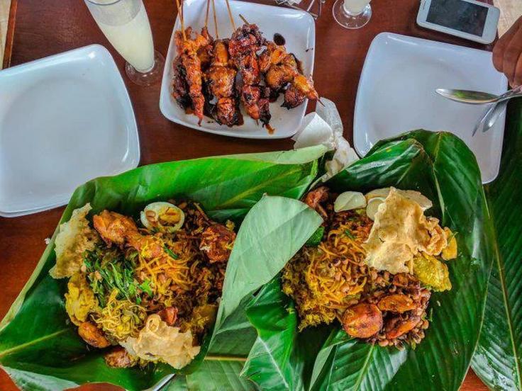 Shot of Nasi Jinggo in abana leaf typical from Bali