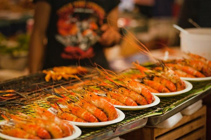 Shot of grilled seafood being grilled with all the spices and condiments