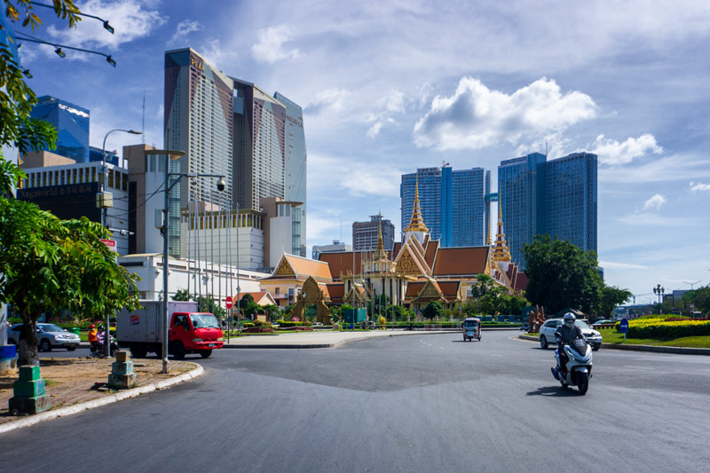 A temple in front of modern high rises