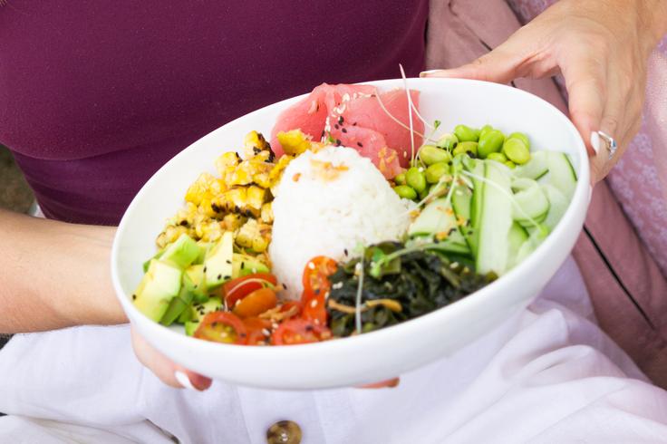 Vibrant and delicious poke bowl from Ubud, Bali, showcasing a delightful blend of fresh ingredients and enticing flavors