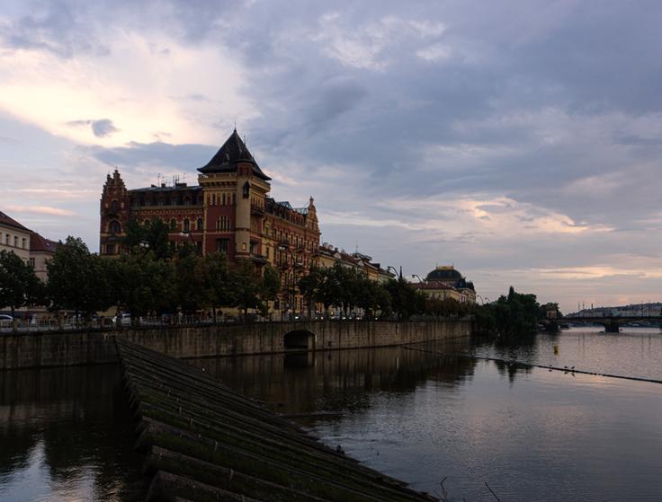 Shot of Prague Old Town monument by the river