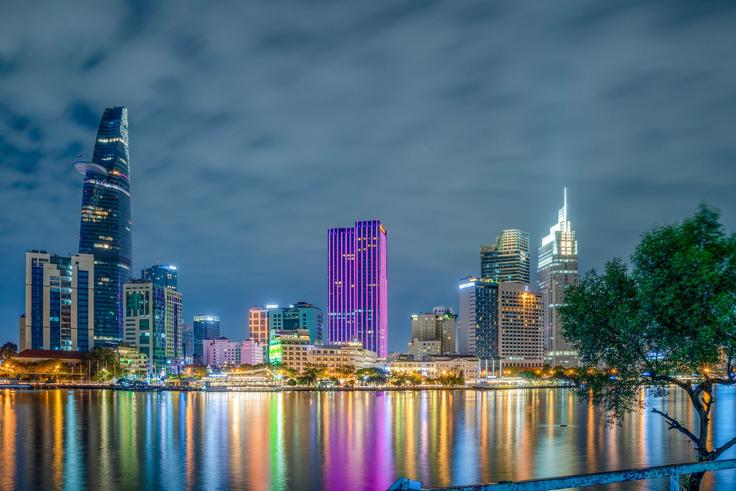 Shot of Ho Chi Minh City at night showcasing the city as an excellent place for a beginner DN