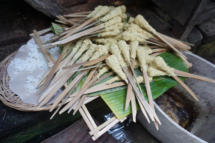 Shot of sate chicken skewers prepared in a basket in Bali