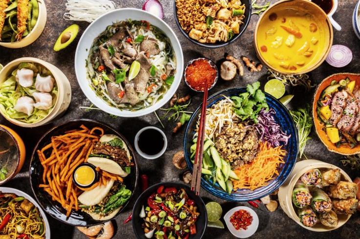 Shot of a Thai table full of food to share like Thai locals do