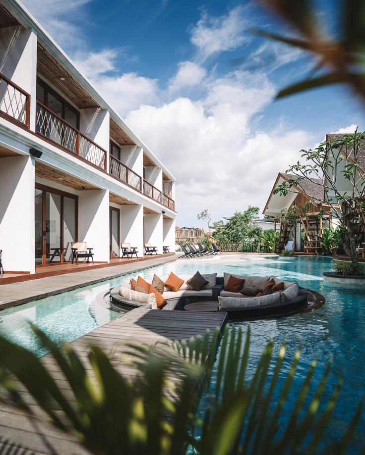 Shot of a pool villa hotel in Seminyak with lounge area at the front