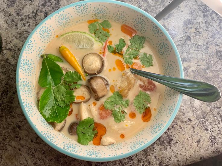 Frontal shot of a Tom Kha Gai coconut dish