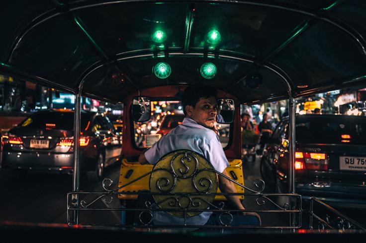 Shot of a tuk tuk car showcasing the typical transportation mean in Thailand