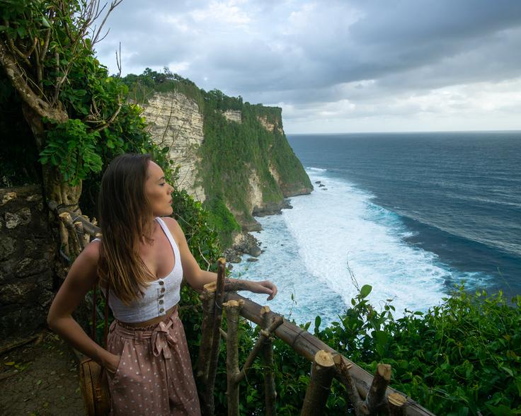 Uluwatu Cliff, a stunning natural wonder in Bali, where dramatic cliffs meet the vast expanse of the ocean, creating a mesmerizing sight that captivates the senses