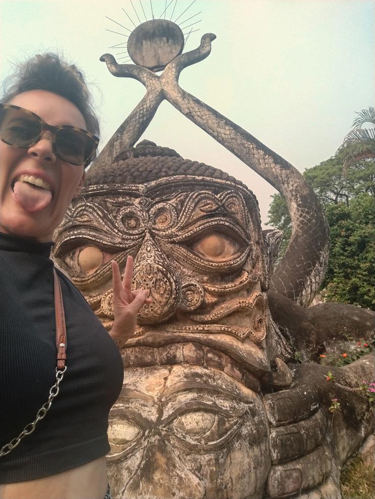 Shot of the multiple Buddha sculptures in The Buddha Park in Vientiane, Laos