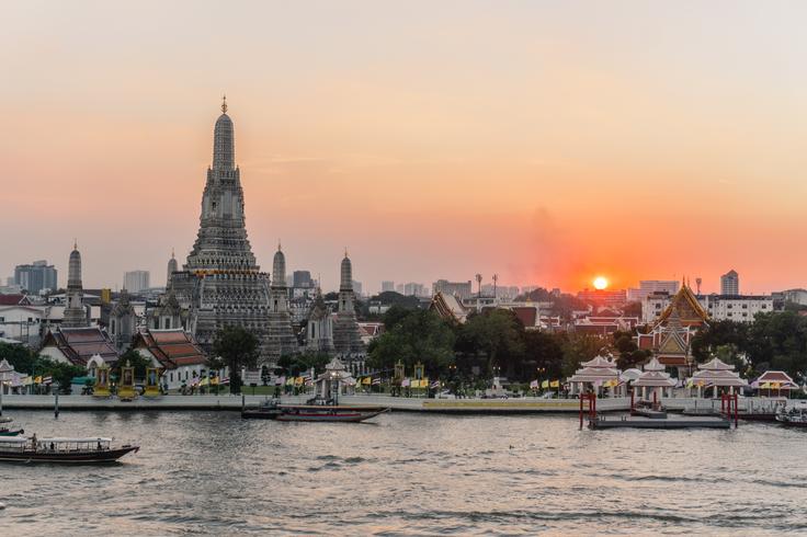 Shot of Wat Arun temple at sunset in Bangkok