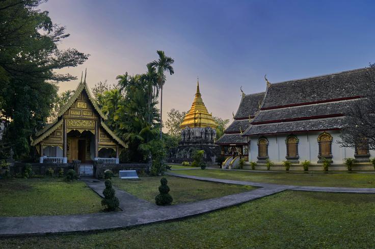 Central photo showcasing the Wat Chiang Man temple of Old Town Chiang Mai