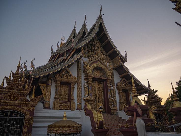 Girl posing in Wat Rajamontean temple