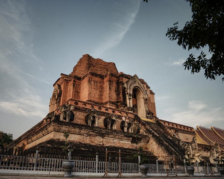 Wat Chedi Luang hindu temple in the form of hindu pyramid in terracota tones